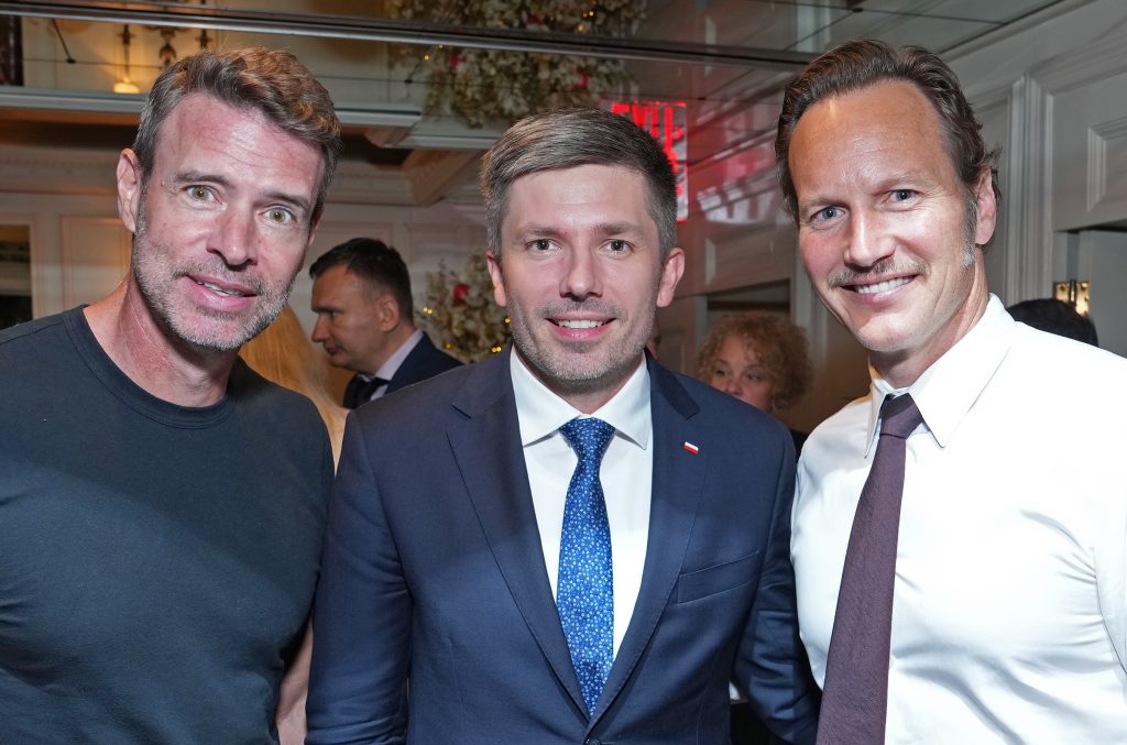 Actors Scott Foley and Patrick Wilson with Adrian Kubicki, Consul General of the Republic of Poland in New York enjoying the Jabłonki celebration hosted by the State of Poland Foundation at The Carlyle Hotel in New York City. on Monday, September 18, 2023 in New York. (Bennett Raglin/AP Images for State of Poland Foundation)
